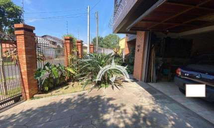 Casa com 3 dormitórios à venda por R$ 980.000 - Jardim Floresta - Porto Alegre/RS