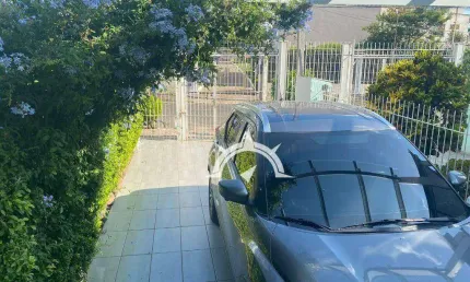 Sobrado com 3 dormitórios à venda por R$ 700.000 - Jardim Itu Sabará - Porto Alegre/RS