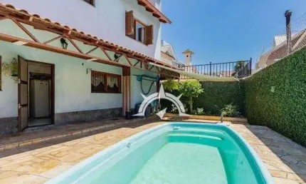 Casa com 4 dormitórios à venda, 245 m² por R$ 799.000,00 - Sarandi - Porto Alegre/RS