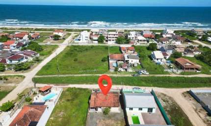 Casa com 3 dormitórios à venda, 114 m² por R$ 600.000,00 - Coroados - Guaratuba/PR
