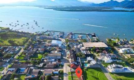 Casa com terreno, com 4 dormitórios à venda, 170 m² por R$ 800.000 - Piçarras - Guaratuba/PR