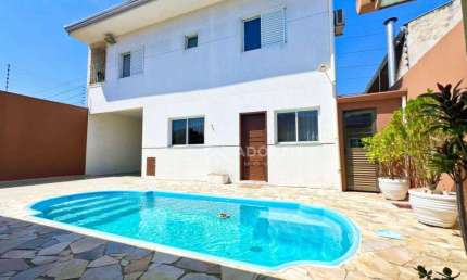 Casa com piscina,  6 dormitórios à venda, 290 m² por R$ 950.000 - Cohapar - Guaratuba/PR