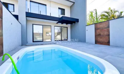 Sobrado com 3 dormitórios à venda, 124 m² por R$ 869.000,00 - Centro - Guaratuba/PR
