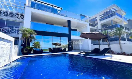 Mansão a beira-mar, com 7 dormitórios à venda, 485 m² por R$ 5.200.000 - Brejatuba - Guaratuba/PR