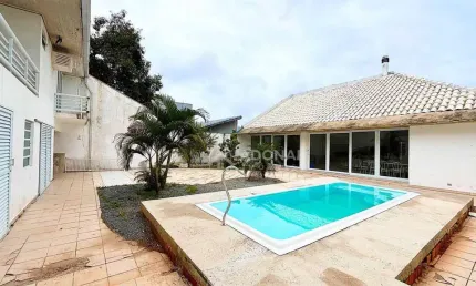 Casa com 7 dormitórios à venda, 324 m² por R$ 980.000,00 - Centro - Guaratuba/PR