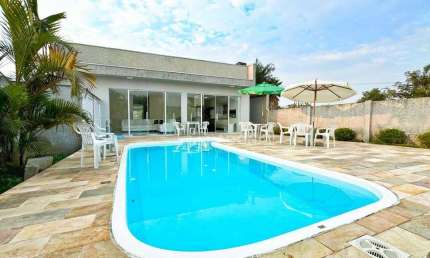 Casa com Piscina, Amplo Terreno, 4 dormitórios à venda, 161 m² por R$ 1.150.000 - Eliana - Guaratuba/PR