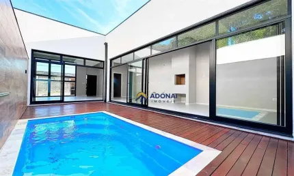 Casa com 3 dormitórios à venda, 133 m² por R$ 1.290.000,00 - Brejatuba - Guaratuba/PR