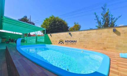Casa com 4 dormitórios à venda, 200 m² por R$ 1.450.000,00 - Brejatuba - Guaratuba/PR