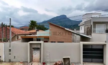 Casa com 3 quartos à venda na rua amazonas, 920, indaiá, caraguatatuba por r$ 1.190.000