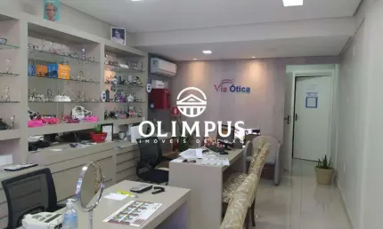 Prédio comercial com salas e apartamentos no bairro centro