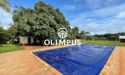 Propriedade Exclusiva com Duas Residências, Piscina Aquecida e Ampla Infraestrutura no Condomínio Morada do Sol