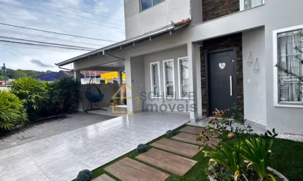 Casa com 4 quartos à venda na Rua das Pitangas, João Costa, Joinville, 164 m2 por R$ 555.000