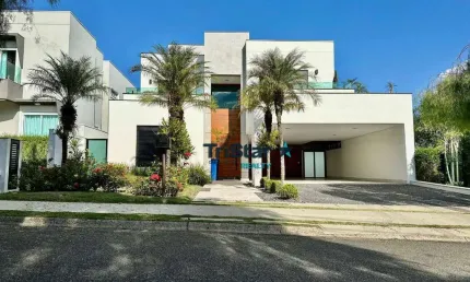 Suntuoso sobrado com arquitetura impar em condomínio fechado