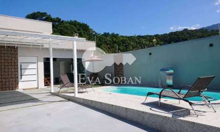 Casa com piscina aquecida, espaço gourmet Massaguaçu