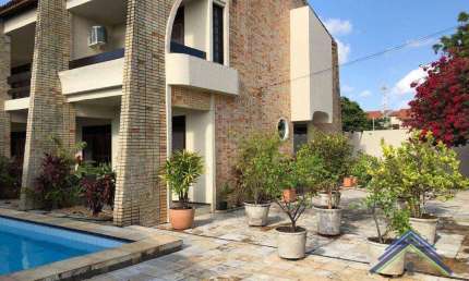 Casa com 5 dormitórios à venda, 410 m² por R$ 1.300.000,00 - Edson Queiroz - Fortaleza/CE