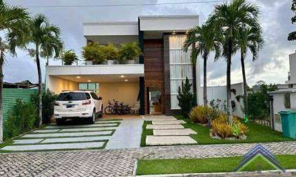 Casa com 4 dormitórios à venda, 238 m² por R$ 1.600.000,00 - Cidade Alpha - Eusébio/CE