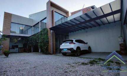 Casa com 3 dormitórios à venda, 330 m² por R$ 990.000,00 - Jangurussu - Fortaleza/CE