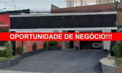 Galpão Comercial à Venda em Taboão da Serra-SP: 4 salas, 4 banheiros, 6 vagas de garagem e 290,30 m² de área no Centro.
