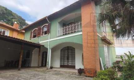 Oportunidade única: Casa à venda no Parque Assunção, Taboão da Serra-SP, com 3 quartos, suíte e 6 vagas de garagem!