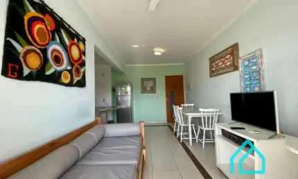 Luxuoso apartamento de 2 dormitórios a uma quadra da praia grande - lazer e conforto integrados!