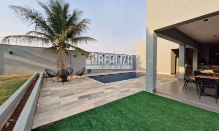 Casa com piscina aquecida e churrasqueira no Condominio Residencial Mario de Almeida Franco - 5 dormitorios