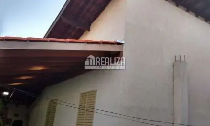 Casa de 3 dormitorios com suite e espaco gourmet no Bairro Conjunto Cassio Rezende