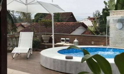 Casa com 4 dormitórios à venda, 293 m² por R$ 1.100.000 - Praia das Palmeiras - Caraguatatuba/SP