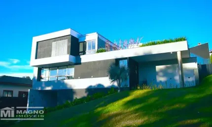 Casa de alto padrão no condomínio aruã ecopark com piscina, 4 suítes e 5 vagas cobertas - mogi das cruzes / sp