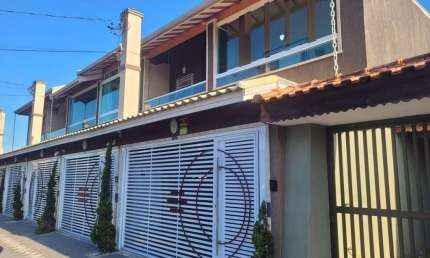 Sobrado Residencial à venda, Caiçara, Praia Grande - SO0137.