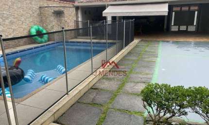 Casa com 3 dormitórios à venda, 211 m² por R$ 890.000,00 - Jardim Real - Praia Grande/SP
