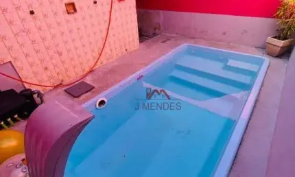 Casa com 2 dormitórios à venda, 135 m² por R$ 440.000,00 - Vila Assunção - Praia Grande/SP