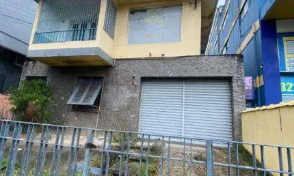 Casa com 3 dormitórios para alugar, 150 m² por R$ 3.500 PACOTE/mês - Vila Mathias- Santos/SP