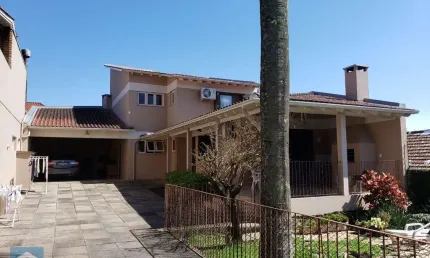 Casa com 3 quartos à venda na rua césar de castro, 163, teresópolis, porto alegre por r$ 780.000