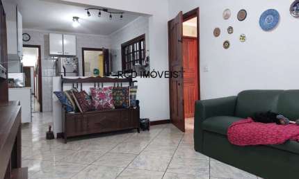 Casa assobradada à venda no Jardim Bonfiglioli com 3 quartos, 1 suíte, 2 banheiros, 3 vagas de garagem, corredor lateral com cobertura retrátil, 102m²