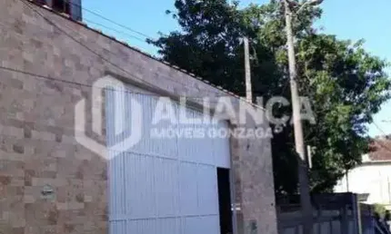 Casa à venda por R$ 700.000,00 - Vila Voturuá - São Vicente/SP