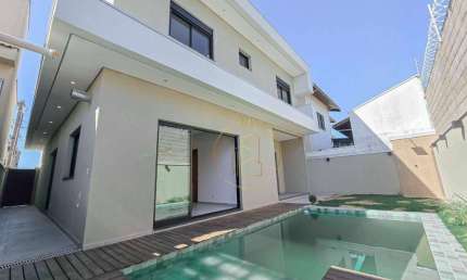 Oportunidade - Sobrado com 4 suites e piscina no Condominio Pinheiros de Tremembé