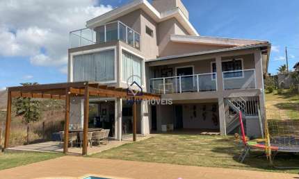 Casa em condomínio fechado com 4 quartos à venda na Honduras, 36, Balneário Água Limpa, Nova Lima por R$ 1.390.000