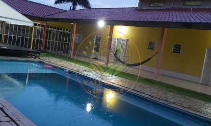 BELÍSSIMA CHÁCARA ESCRITURADA EM CONDOMINIO FECHADO, COM PISCINA, POMAR E RIO! CH00057