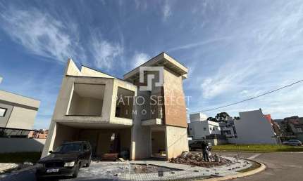 Casa de condomínio com 223 m², 3 quartos sendo 3 suítes à venda no bairro Santa Cândida.