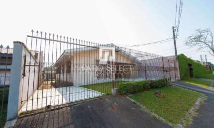 Casa Térrea com 3 Quartos, 6 Vagas de Garagem e Localização Privilegiada