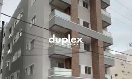 APARTAMENTO 2 DORMITÓRIOS SENDO 1 SUÍTE COM 1 VAGA NA PRAIA GRANDE