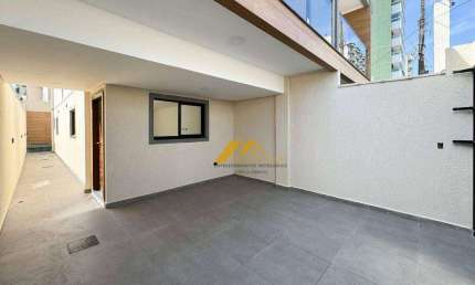Sobrado com 3 dormitórios à venda, 120 m² por R$ 830.000,00 - Vila Guilhermina - Praia Grande/SP