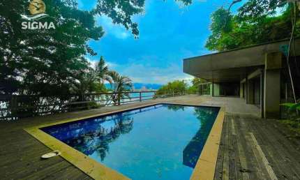 Casa com 5 suítes, piscina e vista para o mar com 2 vagas - Peninsula, Guarujá.