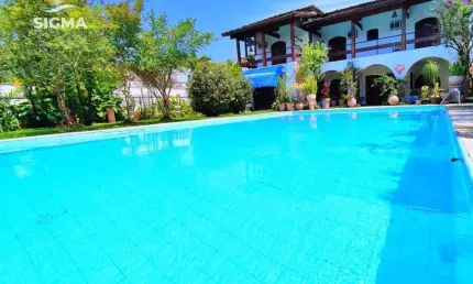 Casa com 5 dormitórios à venda, 550 m² por R$ 7.000.000,00 - Jardim Acapulco - Guarujá/SP