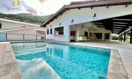 Casa à venda no Condomínio Granville, 480 m² por R$ 2.500.000 - Enseada - Guarujá.