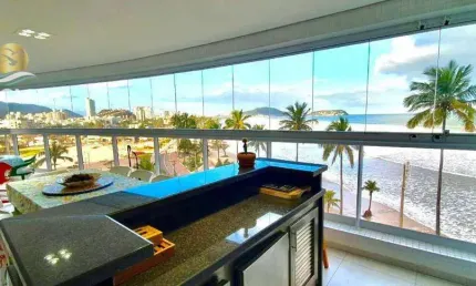 Apartamento de frente para o mar com 4 dormitórios e varanda gourmet em prédio com lazer e 3 vagas de garagem, Praia da Enseada - Guarujá.