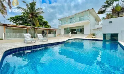 Casa com lazer de frente para o mar - Praia da Enseada, Guarujá.