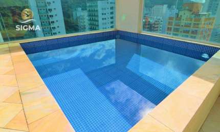 Perto da praia - Cobertura com 2 suítes - Piscina e churrasqueira - Condomínio com lazer - 2 vagas - Pitangueiras - Guarujá/SP.