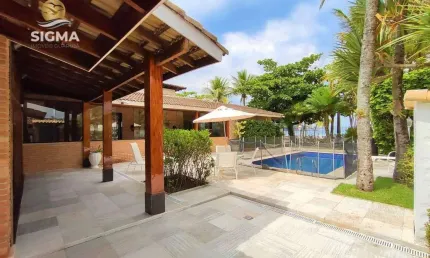 Casa na praia, Frente mar, 4 suítes, Piscina, 6 vagas, Enseada, Guarujá.