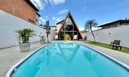 Casa com 4 dormitórios à venda, 130 m² por R$ 670.000,00 - Balneário Praia do Pernambuco - Guarujá/SP